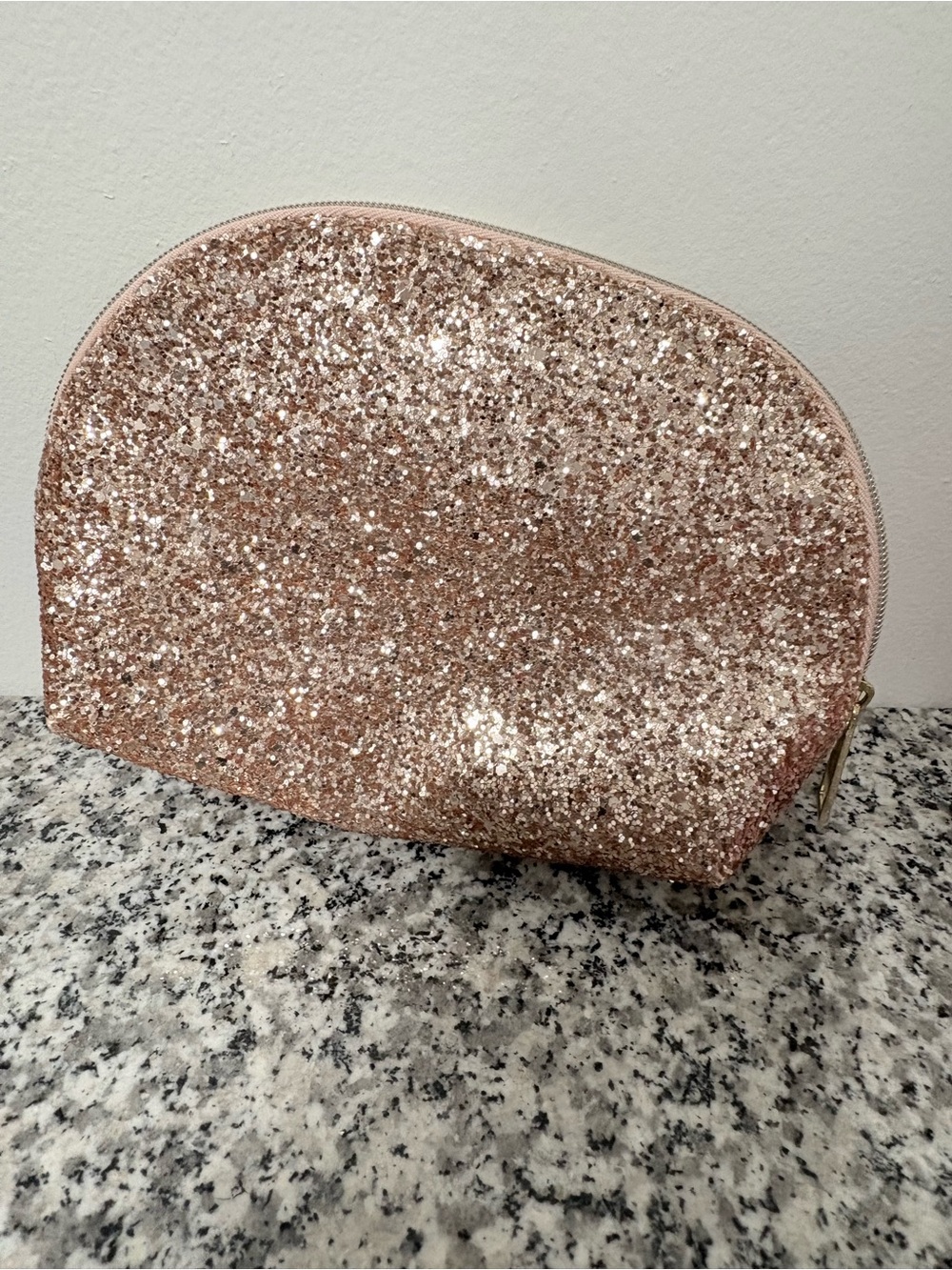 Estée Lauder rose gold glitter cosmetic pouch
